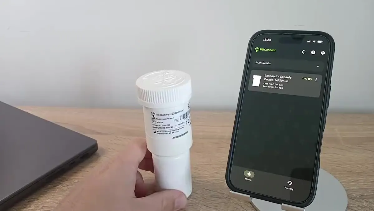 Pill Connect dispenser in use, with a dose event reaching the site team